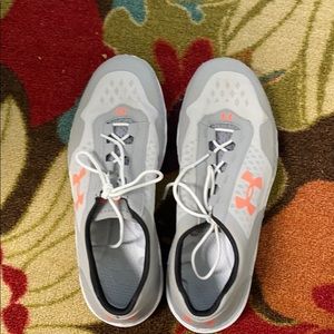 Under armor tennis shoes.